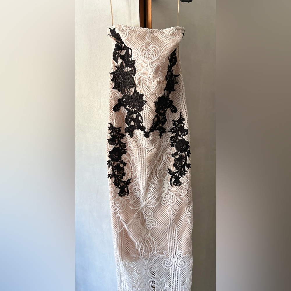 Elegant Lace Dress with Black Floral Accents